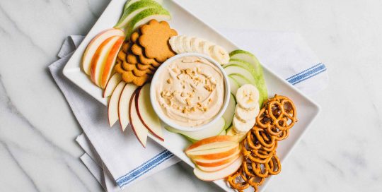 Peanut Butter Fruit Dip: Ready in minutes, this peanut butter yogurt dip pairs well with your favorite fruits, pretzels or cookies.